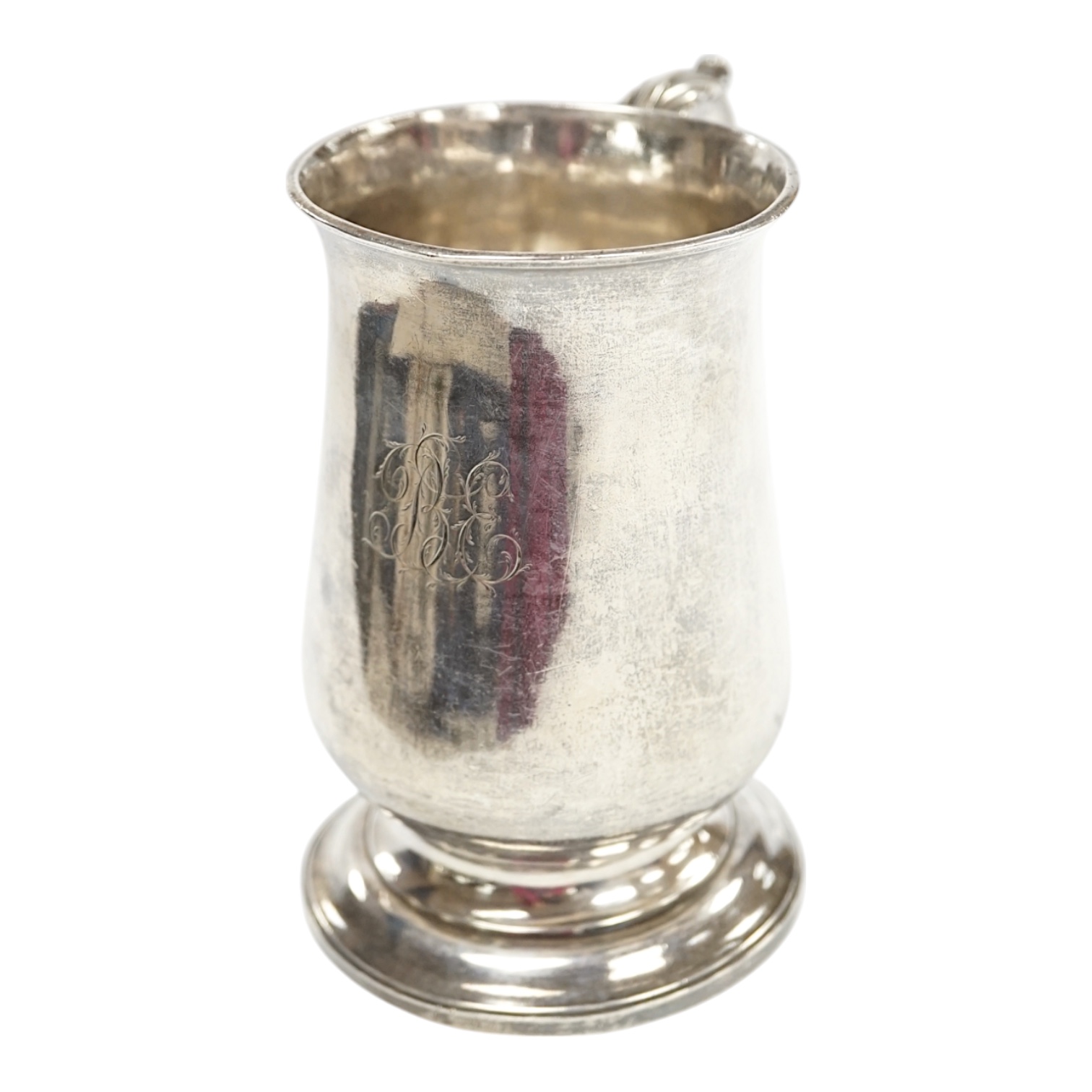 A George III silver baluster mug, William Turton, London, 1779, 12.5cm, 10.8oz. Condition - fair